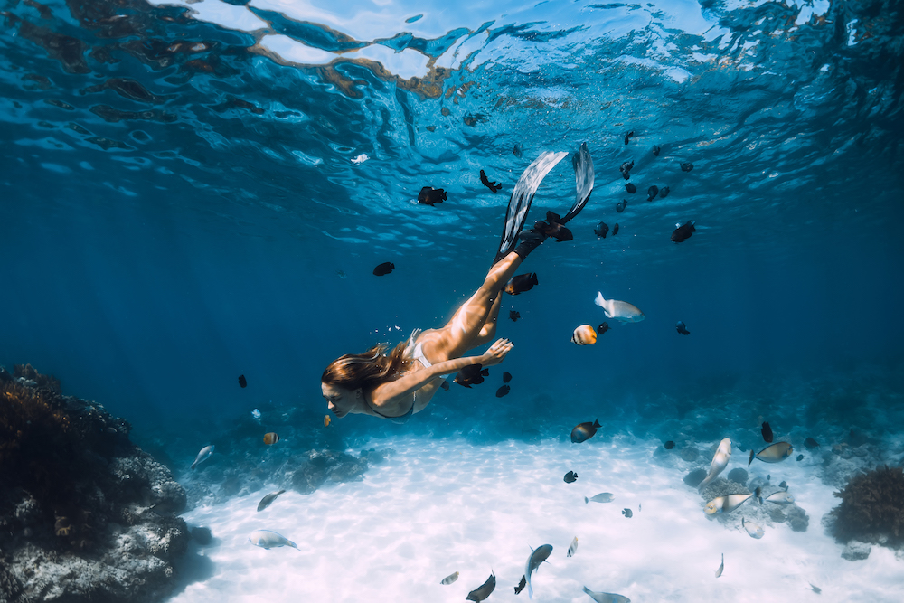 free diver in clear water