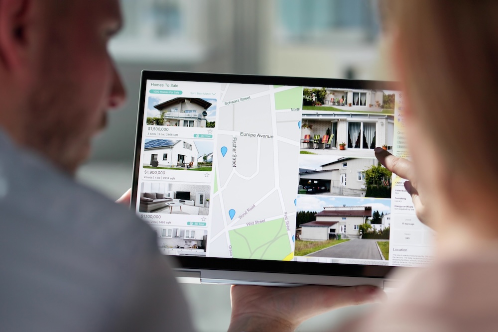 Couple searching vacation rental property